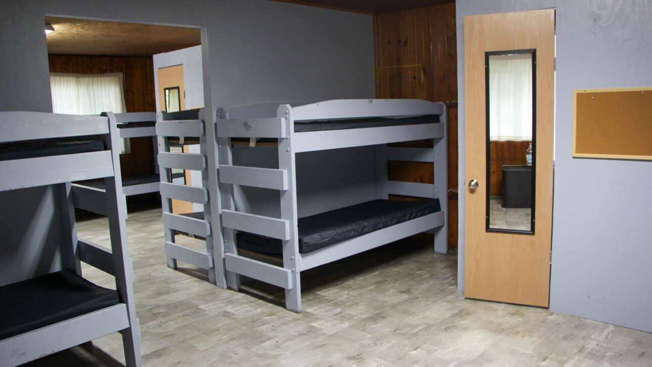 Bunk beds in an Iowa summer camp room.